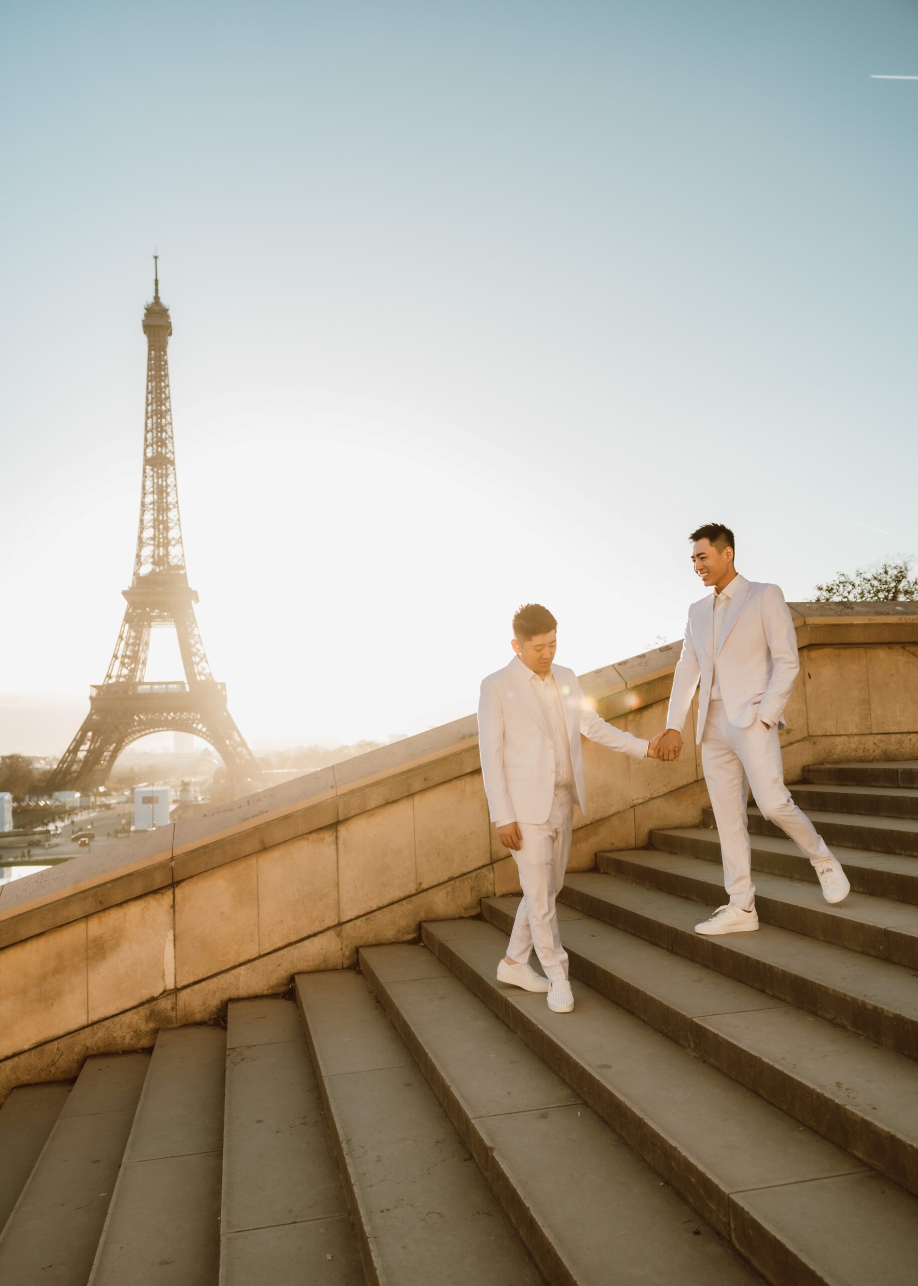 Elegant couple gay photoshoot Paris Trocadéro view