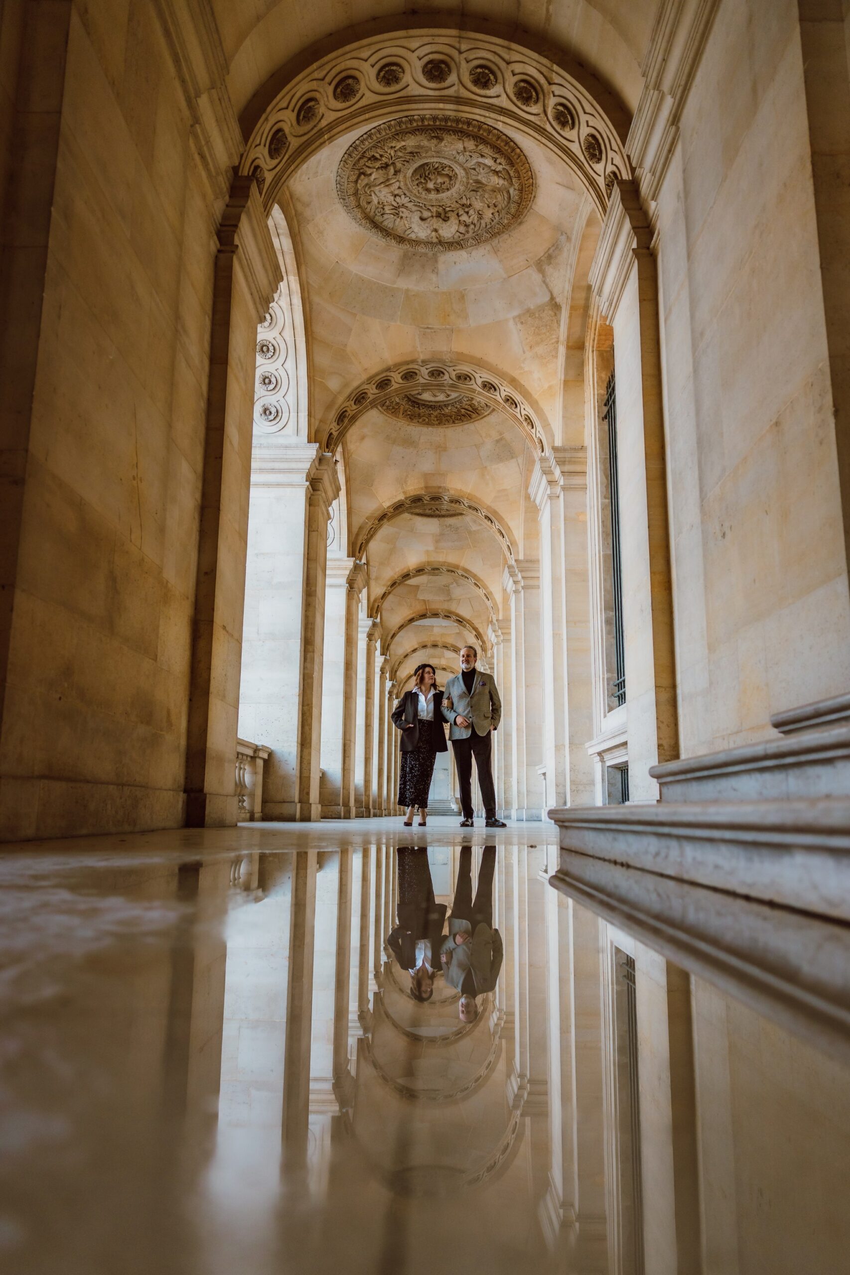 Elegant couple senior photoshoot Paris Palais Royal architecture