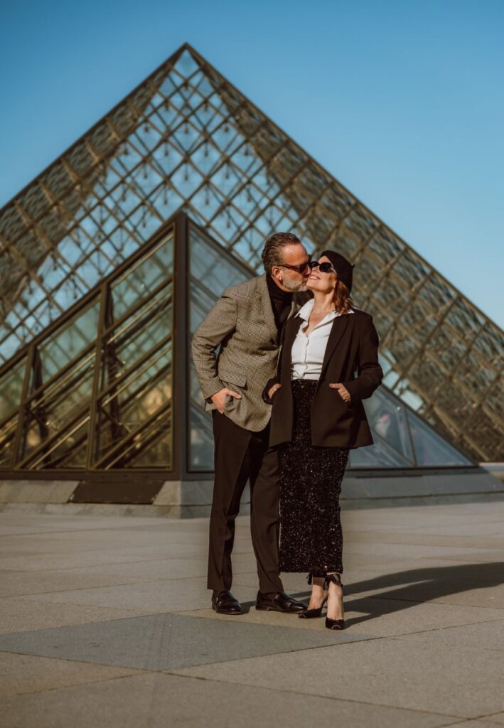 Stylish couple senior photoshoot Paris Louvre pyramid